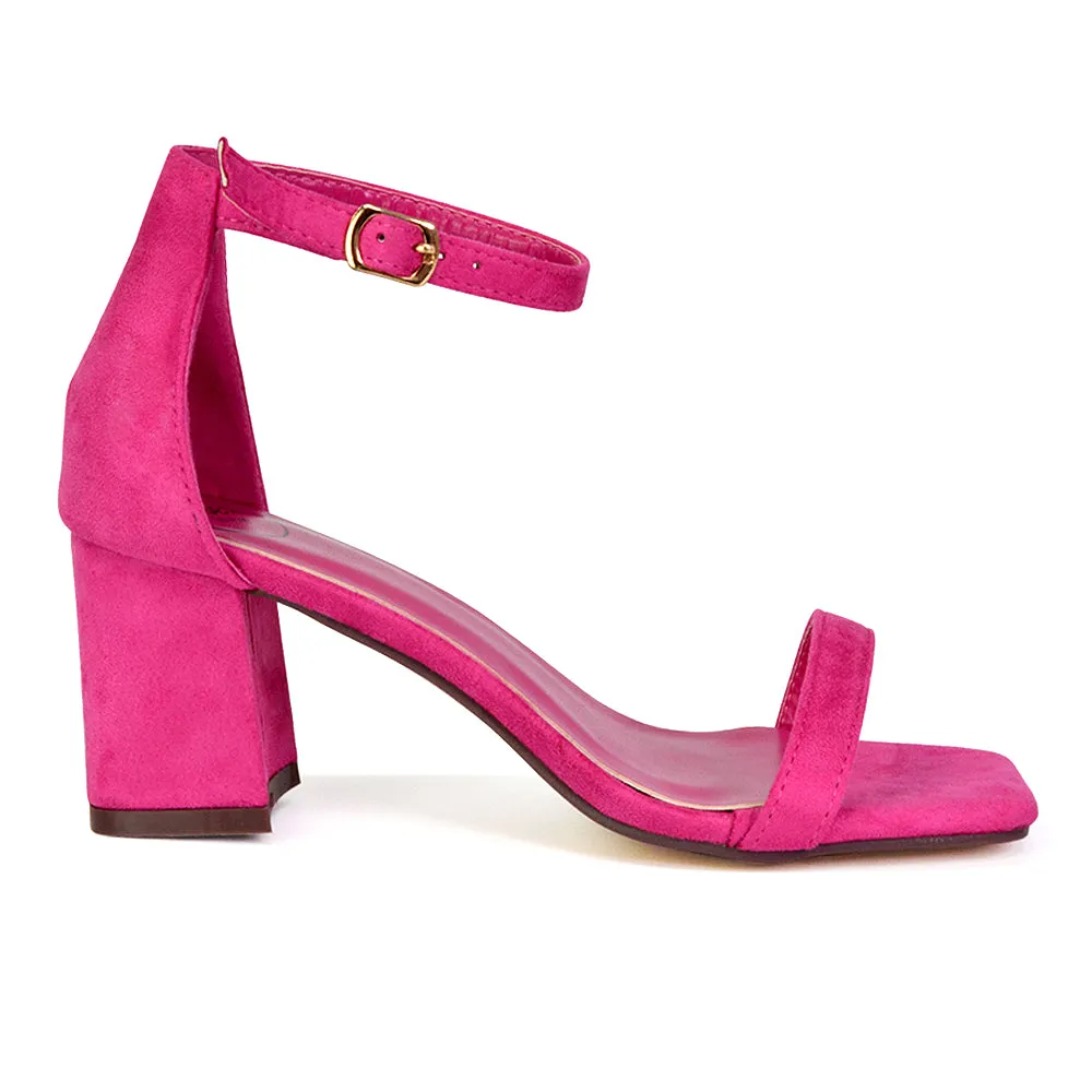 Antigoni Basic Strappy Low Mid Block Heel Square Toe Sandals in Fuchsia