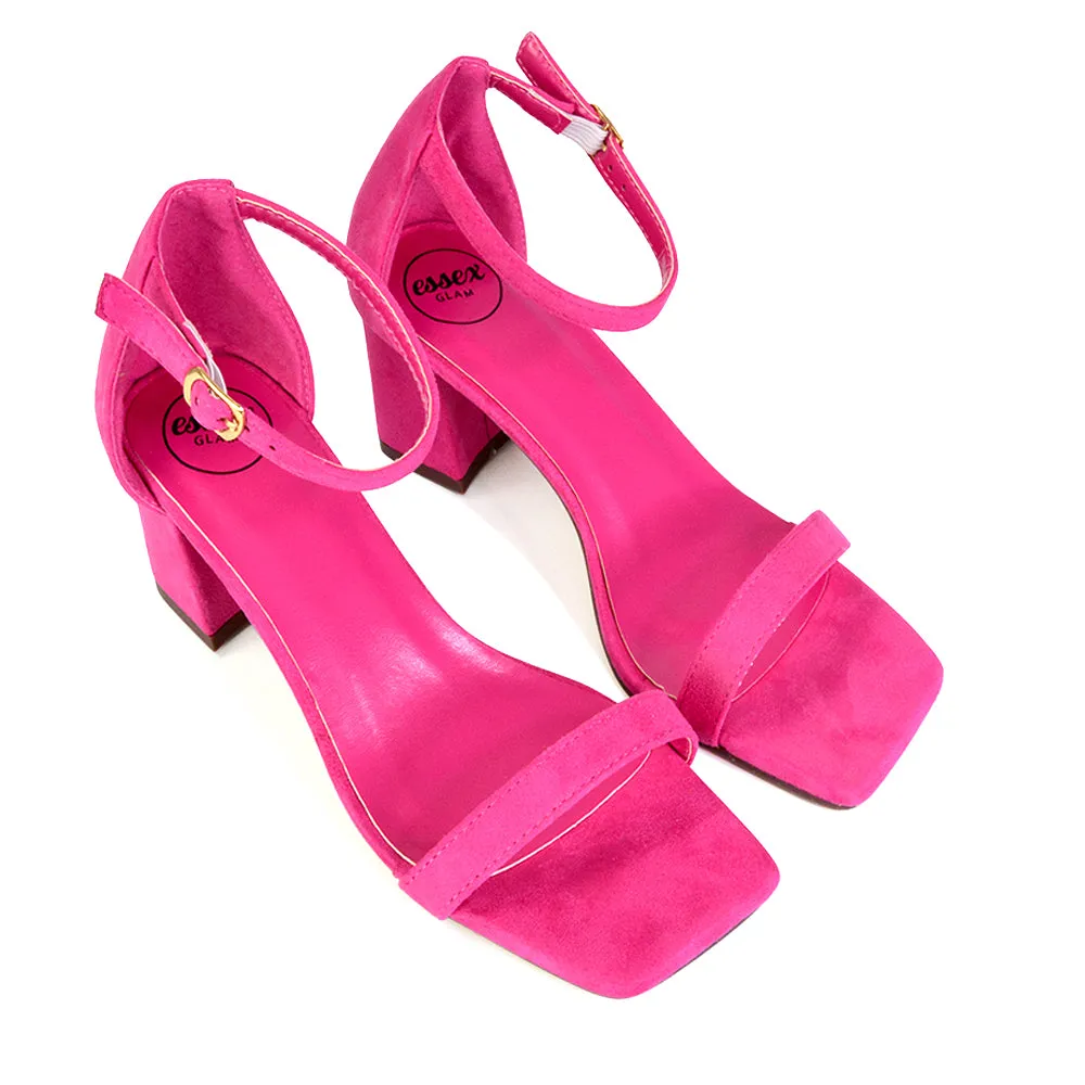 Antigoni Basic Strappy Low Mid Block Heel Square Toe Sandals in Fuchsia