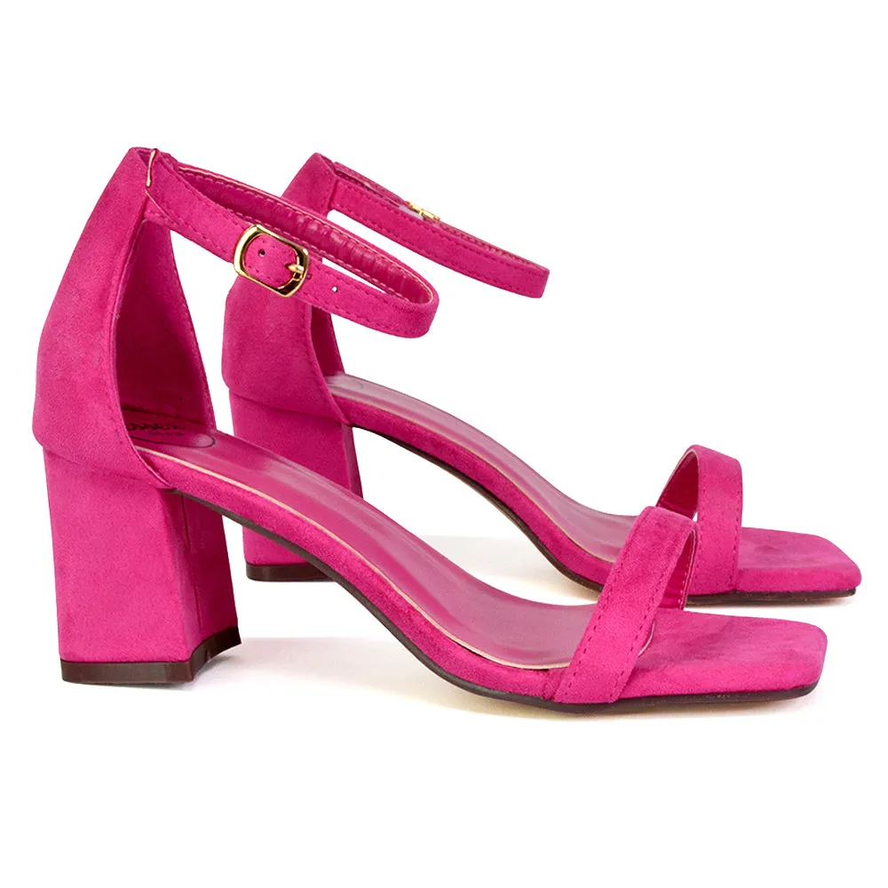 Antigoni Basic Strappy Low Mid Block Heel Square Toe Sandals in Fuchsia