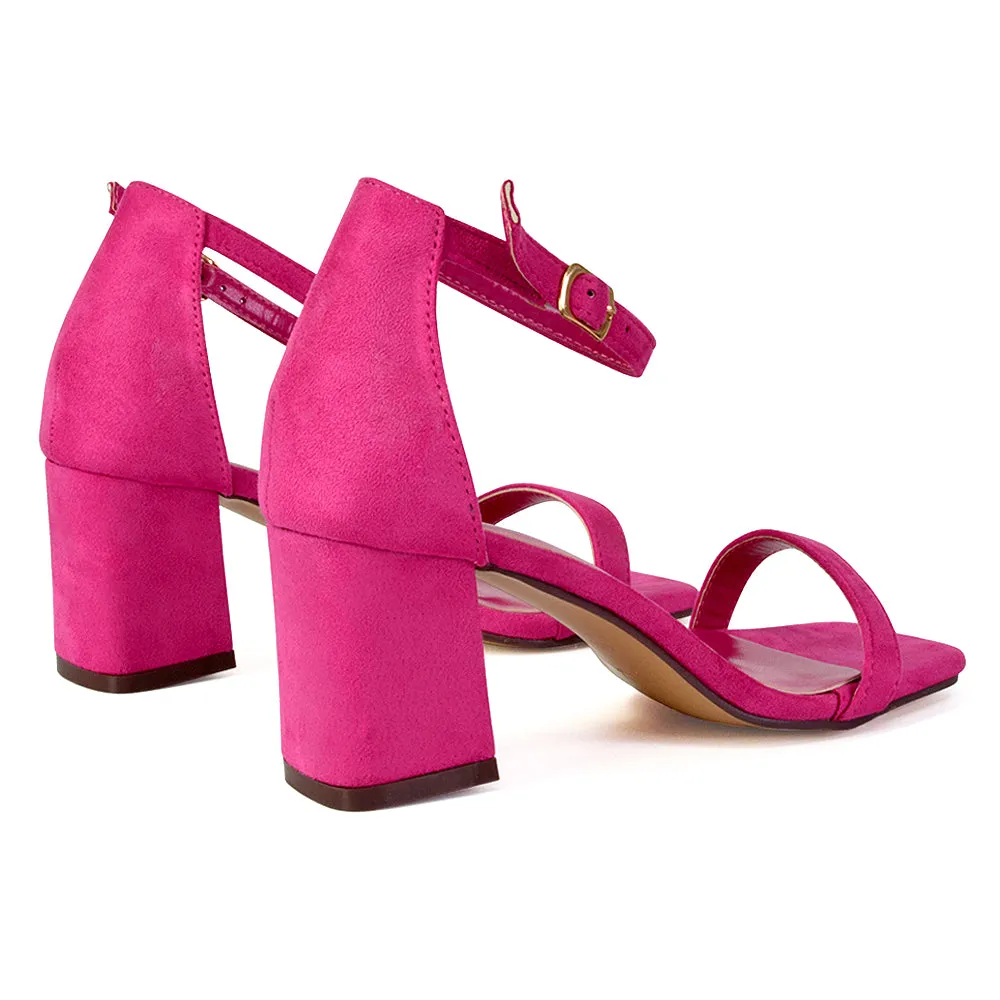 Antigoni Basic Strappy Low Mid Block Heel Square Toe Sandals in Fuchsia